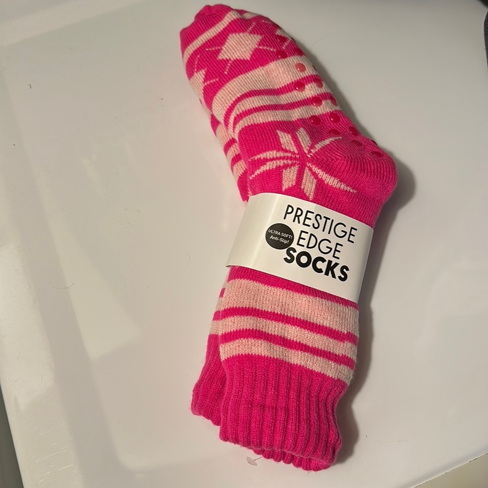 Fuzzy, fleecy socks with grips on bottom
